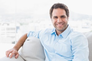 Man smiling after his outpatient program