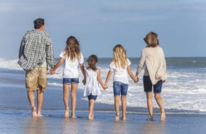 family on beach