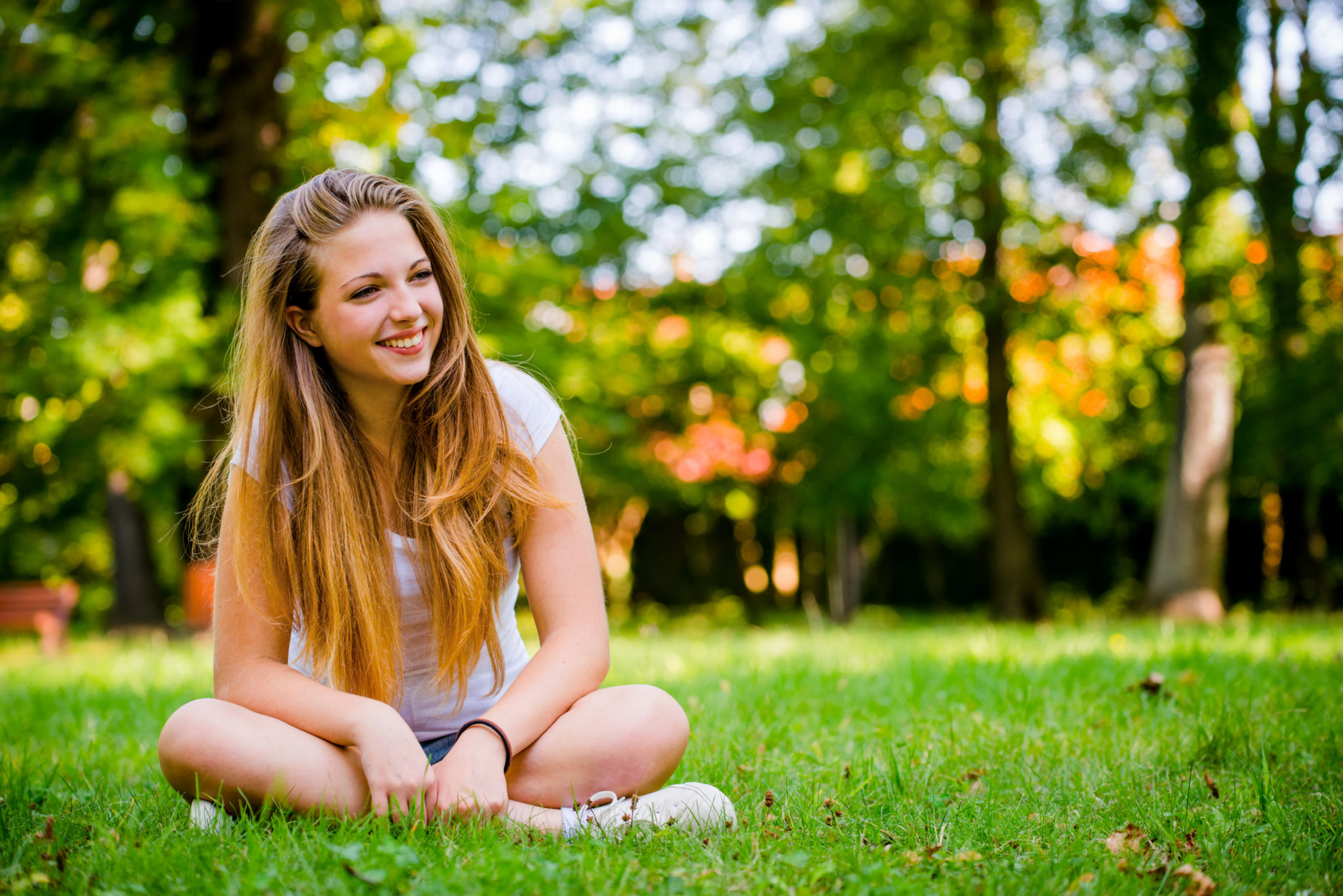 young happy woman in nature