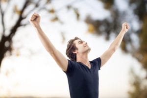 man rejoicing in nature