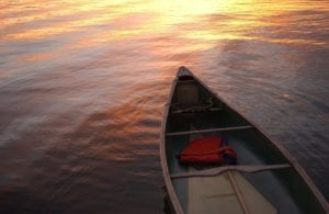 lake with canoe