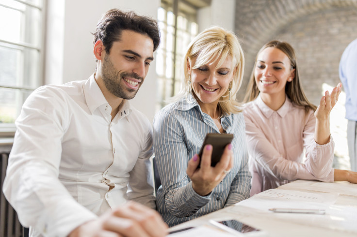 People looking at phone