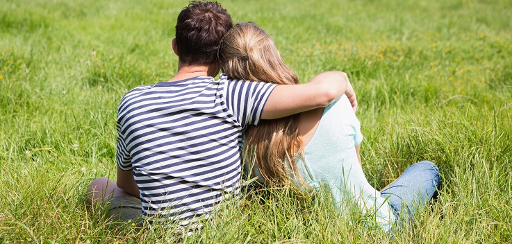 couple in tall grass