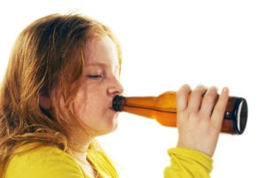 young girl drinking beer