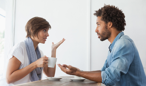 man and woman talking