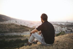 man overlooking city