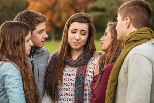 girl in intervention with friends