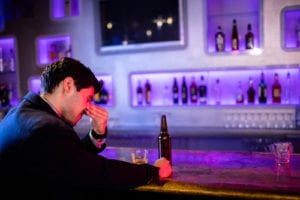 man alone at bar