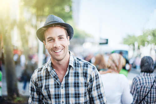 Man in hat and plaid shirt