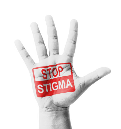 STOP stigma written on hand