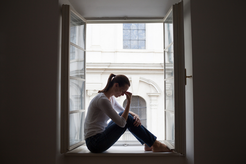 woman pinching forhead