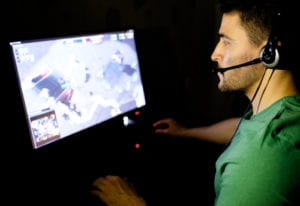 man playing video game