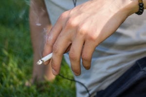 hand holding cigarette