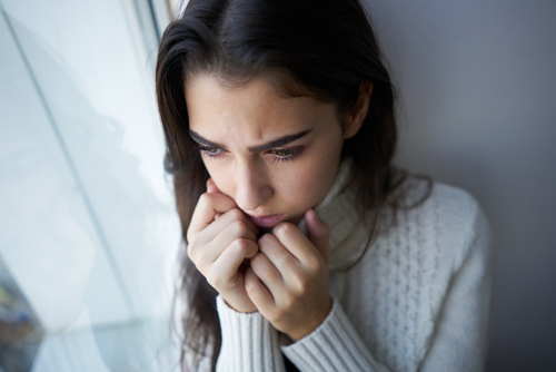 woman looking anxious