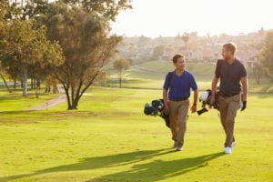 men walking on golf course