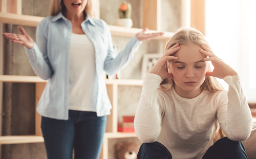 frustrated girl ignoring angry mom