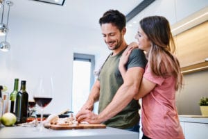 happy couple in kitchen