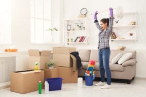 woman happy to move and clean