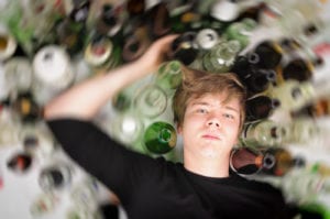 kid with spinning bottles around him