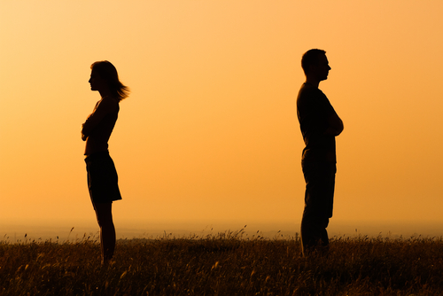 couple with arms crossed