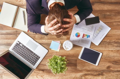 man holding head in anxiety