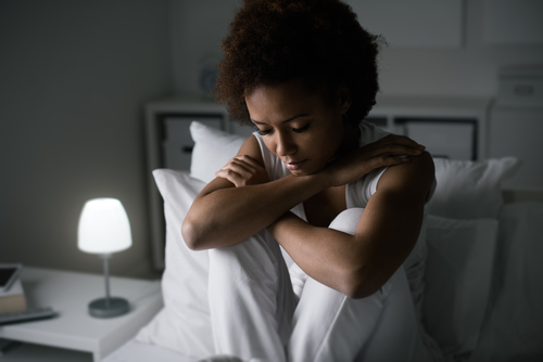 woman awake in bed