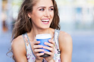 woman holding coffee