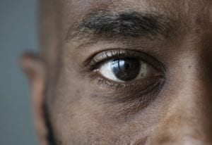 Closeup of an eye of a black man