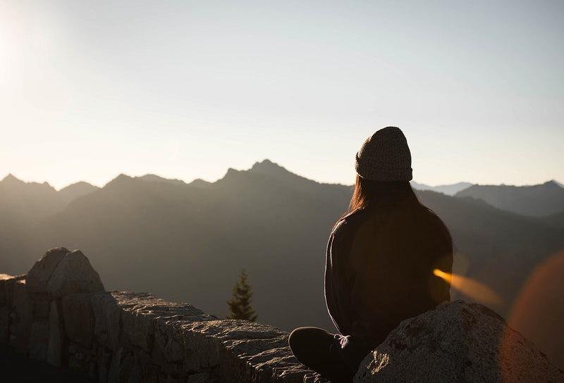 Person-looking-out-at-mountains