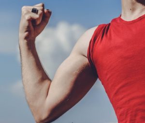 Man-flexing-arm.